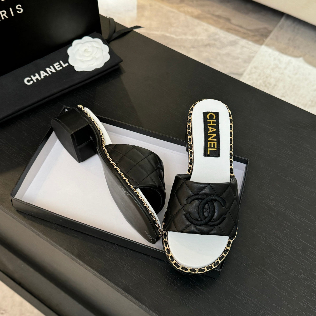 CHANEL HIGH FLATFORM SLIPPER IN BLACK EMBOSSED SHEEPSKIN